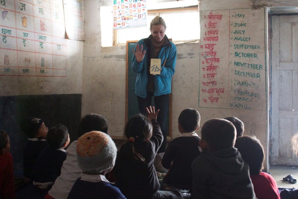Teacher educating kids in Nepal